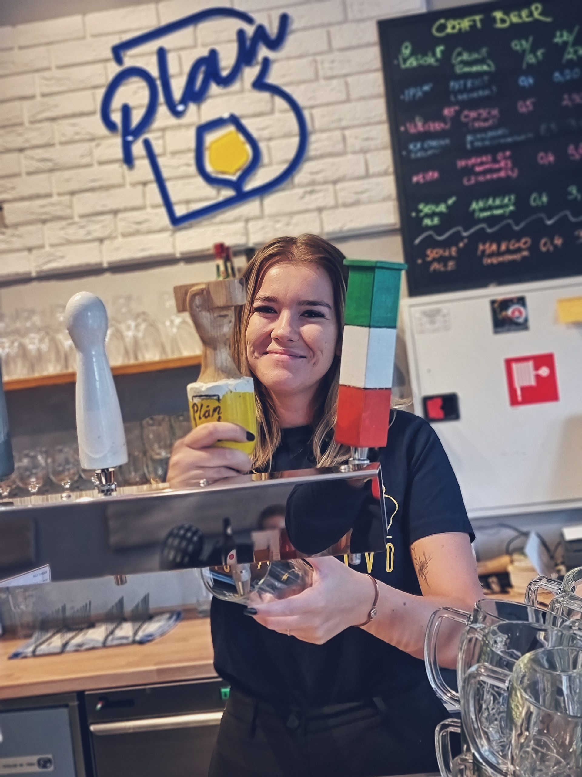 Slovak girl bartender in craftbeer pub